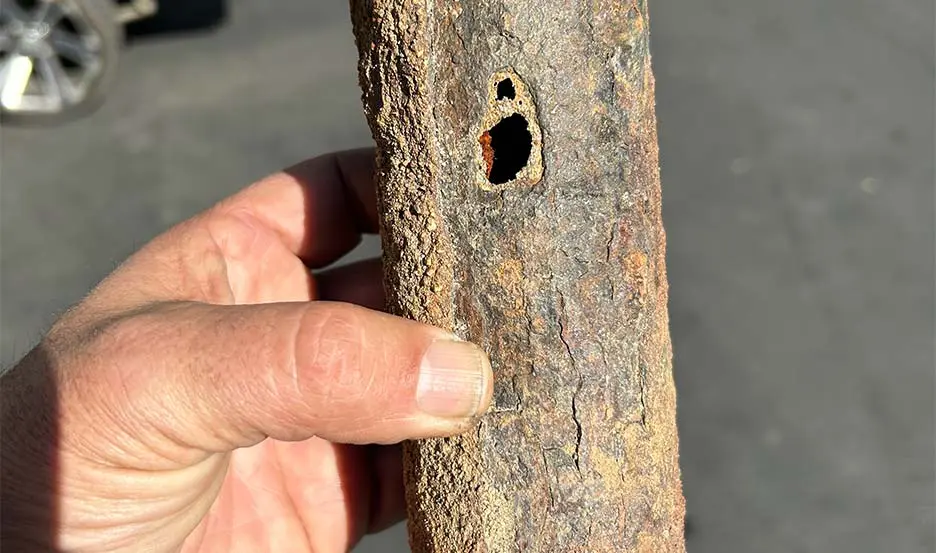 old pipe with hole