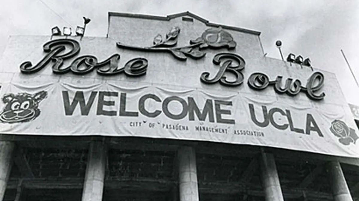 welcome ucla banner on front of rose bowl in black and white